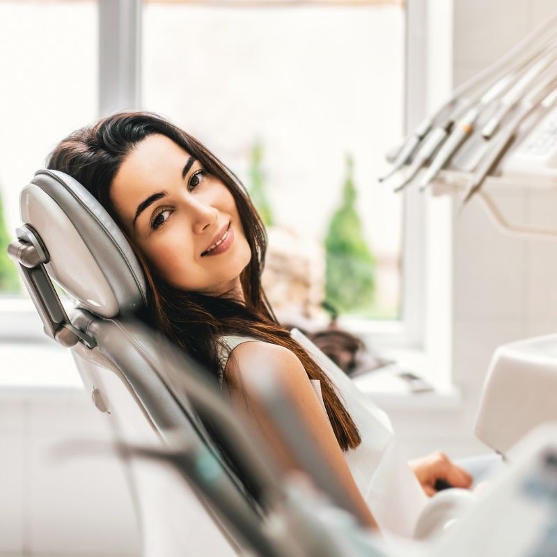Azad Dentals Patna (12) A smiling man sits in a dental chair